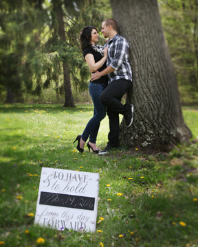 Engagement Couple With Sign