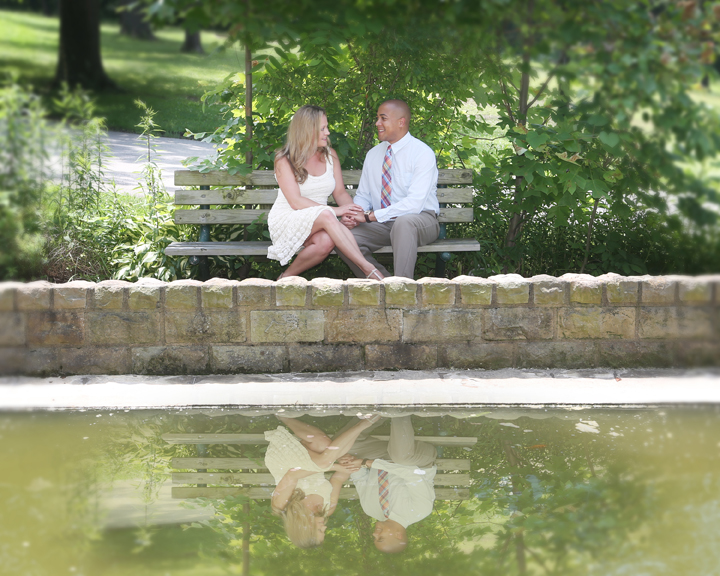 Engagement photo of  reflection in pond at Renzie