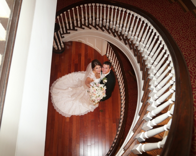 Bride and Groom at University Club Spiral Staircase