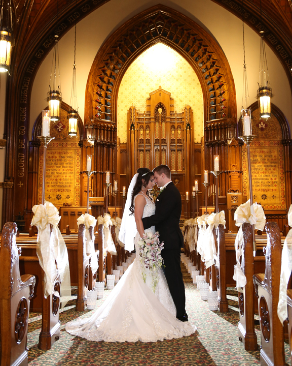 Photo of a Bridal Couple in Center Aisle at Calvary United Methodist